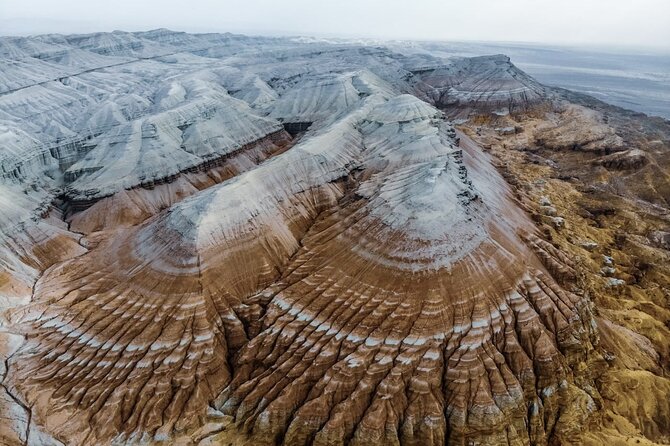 Altyn Emel, Singing Dune, Charyn canyon, Kolsay, Kaindy lake 4 days tour - Day one: Aktau and Katutau in Altyn Emel