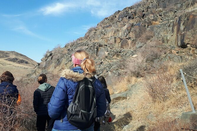 Petroglyphs of Tanbaly UNESCO World Heritage Site - The private format and the role of the guide
