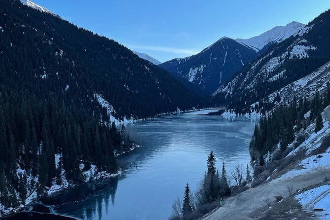 Private Outdoor Travel to Explore Kazakhstan - Kaindy Lake and its upright tree trunks