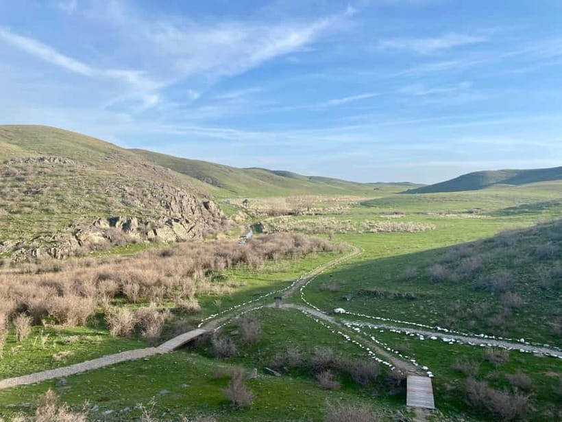 Tanbaly Gorge: Ancient Petroglyphs UNESCO Site Day Tour - The morning pickup and long road west