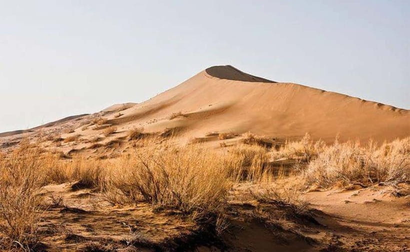 Two Day Tour to Altyn Emel: Singing Dune and Aktau Mountain - Katutau brings darker volcanic shapes